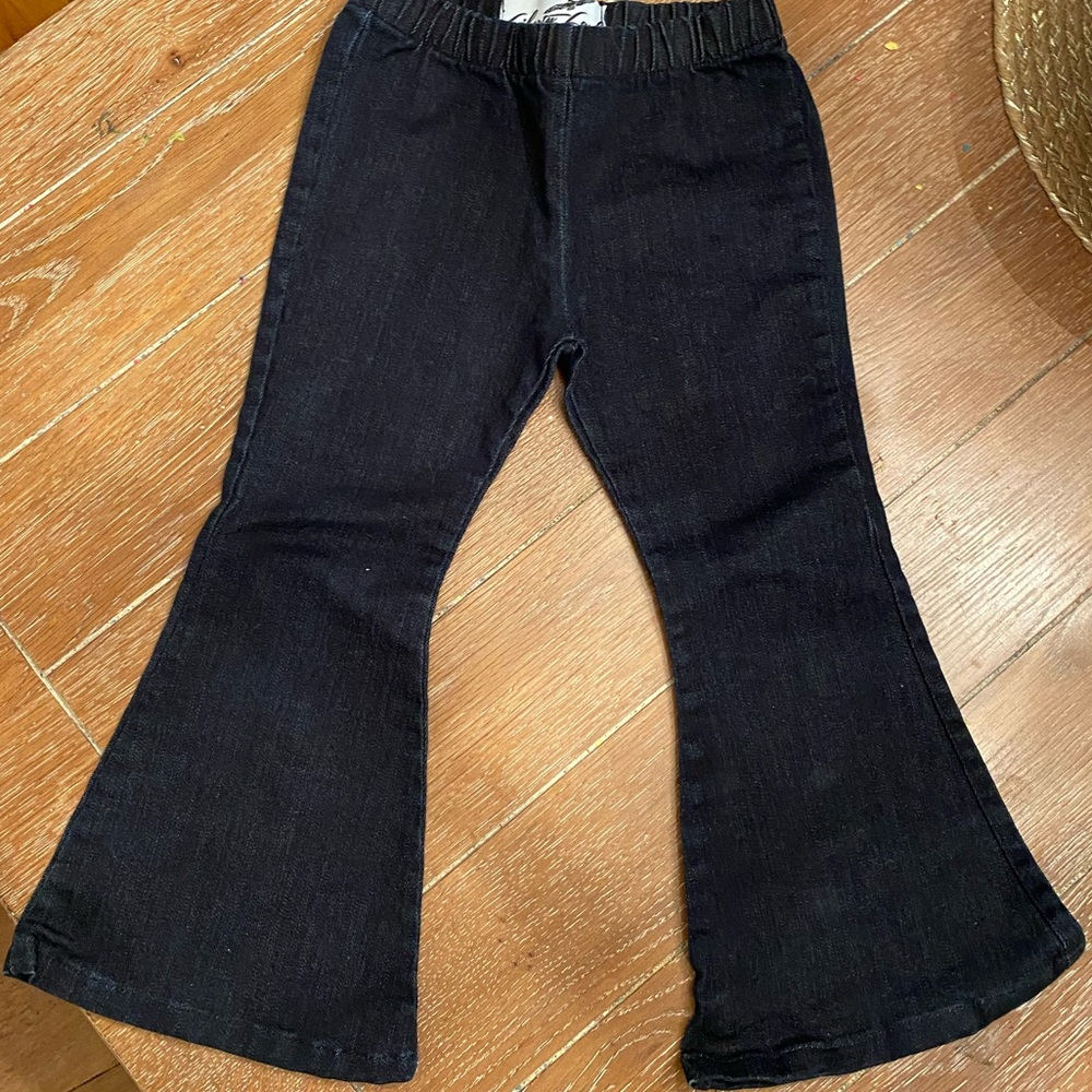 Dark jean bell bottoms with elastic waist.
